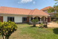 2 houses for sale in Entebbe 40 decimals at 900m